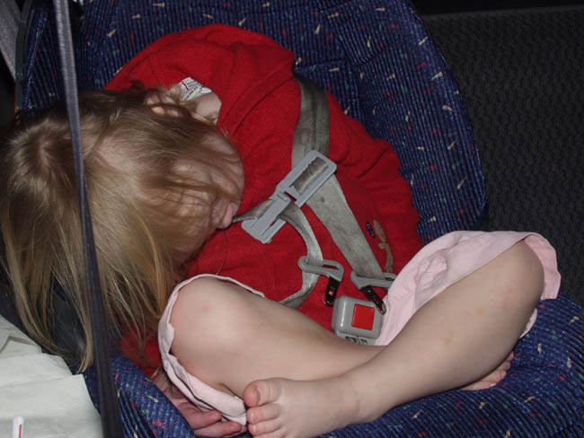 Emily Dead sleeping in the car seat